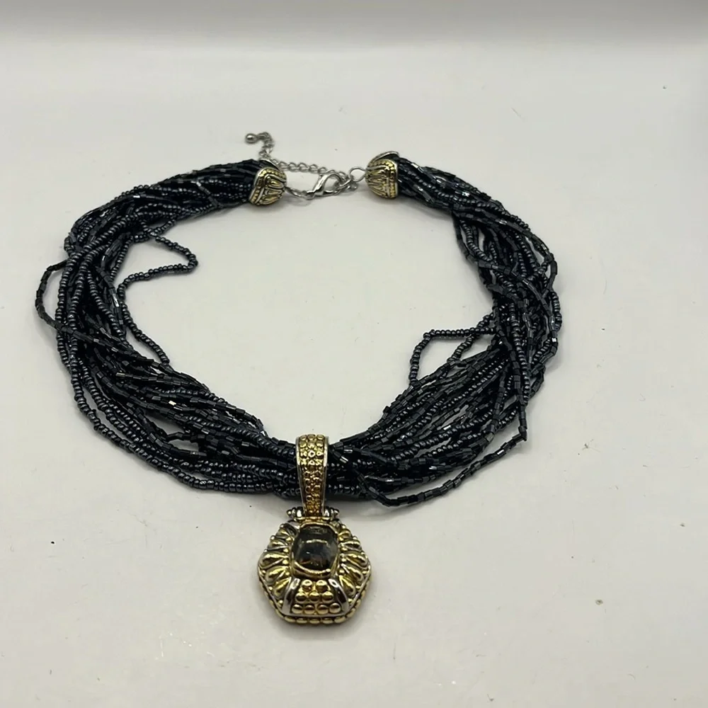 Elegant Black Beaded Necklace with Gold and Silver tone Pendant with Quartz